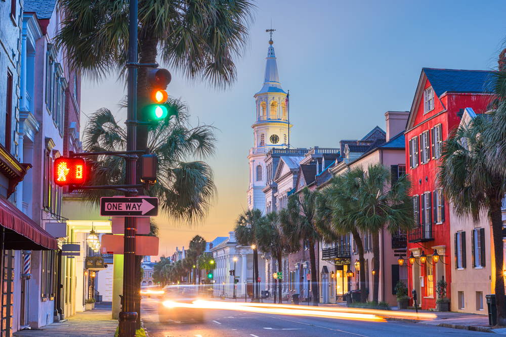 Historic French Quarter street in downtown Charleston, South Carolina at twilight